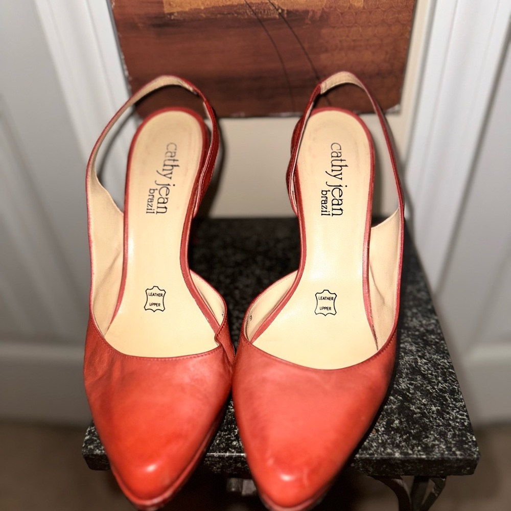 Red sling back heels with leather upper material